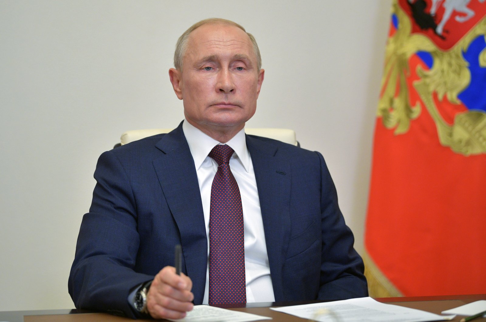Russian President Vladimir Putin chairs a meeting with members of a working group to prepare proposals on amending the Russian Constitution via teleconference in Moscow, July 3, 2020. (AP Photo)