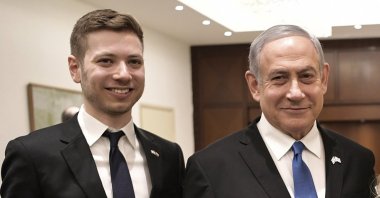 Israeli Prime Minister Benjamin Netanyahu, Yair Netanyahu pose for a photo, Tel Aviv, Jan. 23, 2020. (AP Photo)