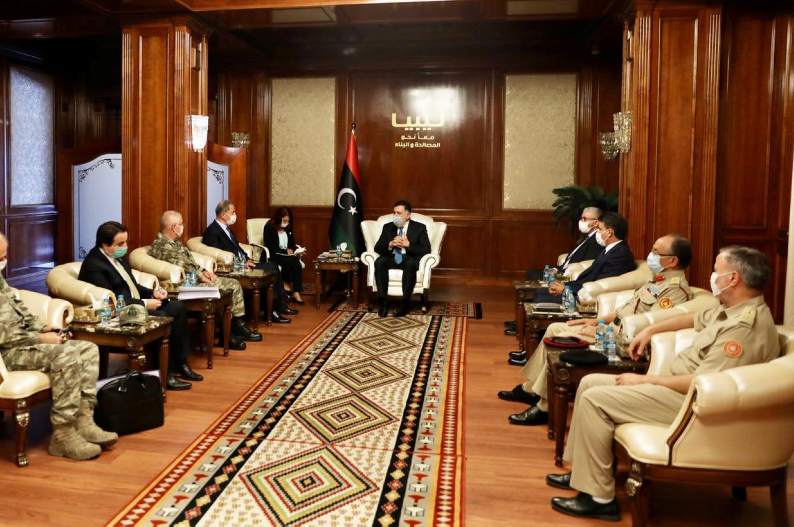 Defense Minister Hulusi Akar during a meeting with Libya's internationally recognized Prime Minister Fayez al-Sarraj in Tripoli, Libya, July 3, 2020. (Reuters Photo)