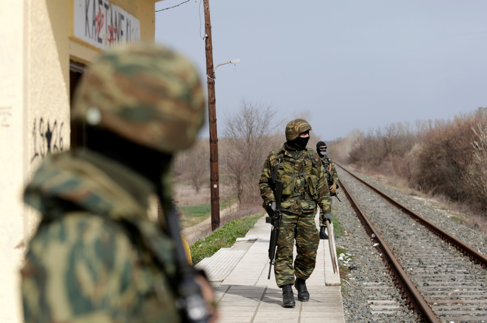Greek soldiers secure a train station near Turkey's Pazarkule border crossing, in Kastanies, Greece March 8, 2020. (Reuters File Photo)