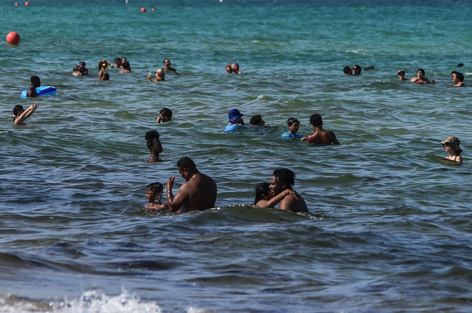 People enjoy the water at Miami Beach, Florida, U.S., July 2, 2020. (AFP Photo)