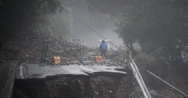 A road that collapsed due to heavy rain is seen in Kuma, Kumamoto prefecture, Japan, July 7, 2020. (AFP Photo)