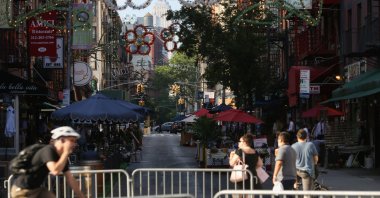 People dine outside on Mulberry Street in Lower Manhattan, New York City, New York, U.S., July 4, 2020. (Reuters Photo)