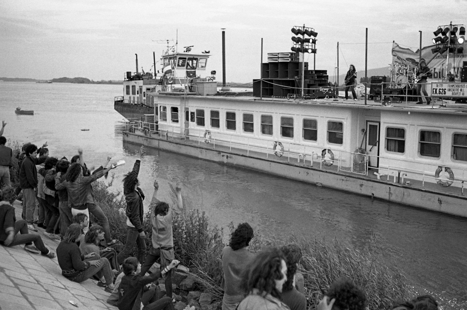 This old photo showing people listening to a concert by the Danube river is one of the photos on display at the exhibition. (Courtesy of Hungarian Cultural Center)