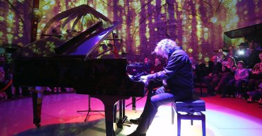 Tuluyhan Uğurlu performs in a concert in this photo provided on May 21, 2018. (AA PHOTO)