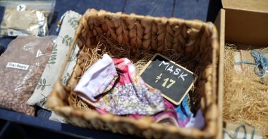 Masks are seen for sale at the Lady Byrd Cafe, amid the outbreak of the coronavirus disease (COVID-19), in Los Angeles, California, U.S., July 7, 2020. (Reuters Photo)