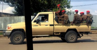 Ethiopian military ride on their pick-up truck as they patrol the streets following protests in Addis Ababa, Ethiopia on July 2, 2020. (Reuters Photo)