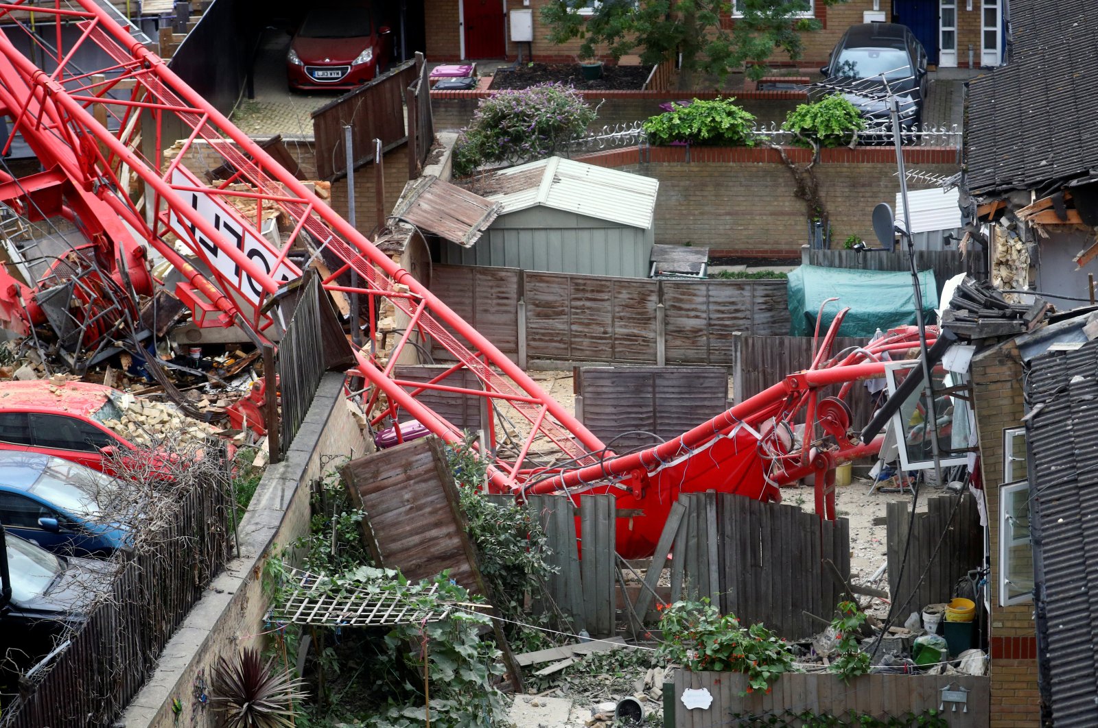 A collapsed crane is seen near a construction site in Bow, east London, Britain, July 8, 2020. (Reuters Photo)