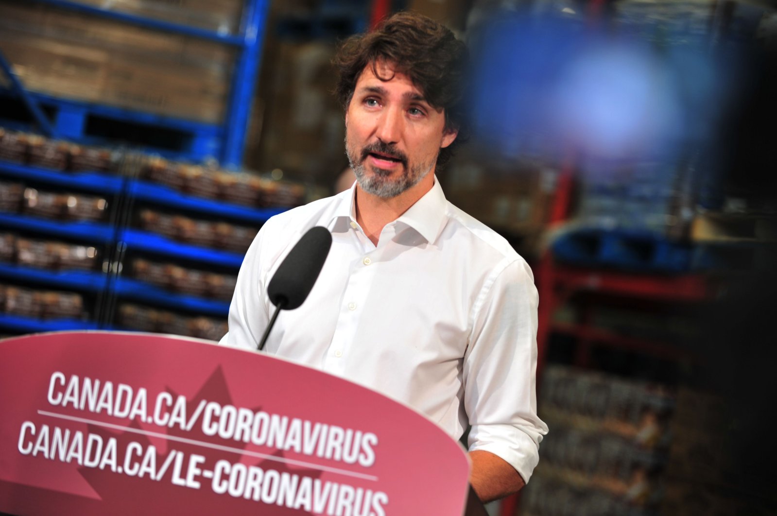 In this file photo taken on July 3, 2020 Canadian Prime Minister Justin Trudeau speaks to the press as he volunteers at the Moisson Outaouais food bank in Gatineau, Quebec, Canada during the coronavirus pandemic. (AFP Photo)