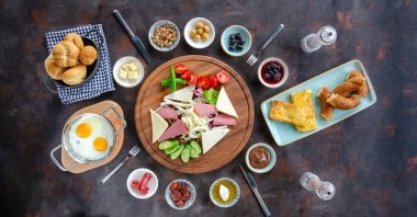 A Turkish breakfast has many elements, including but not limited to eggs, olives, honey, butter, cheese and bread. (iStock Photo)