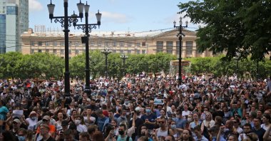 People take part in a rally in support of the governor of the far eastern Khabarovsk region Sergei Furgal, who is being held in pre-trial detention after being charged with organizing the murder of several entrepreneurs 15 years ago, Khabarovsk, Russia July 11, 2020. (Reuters Photo)