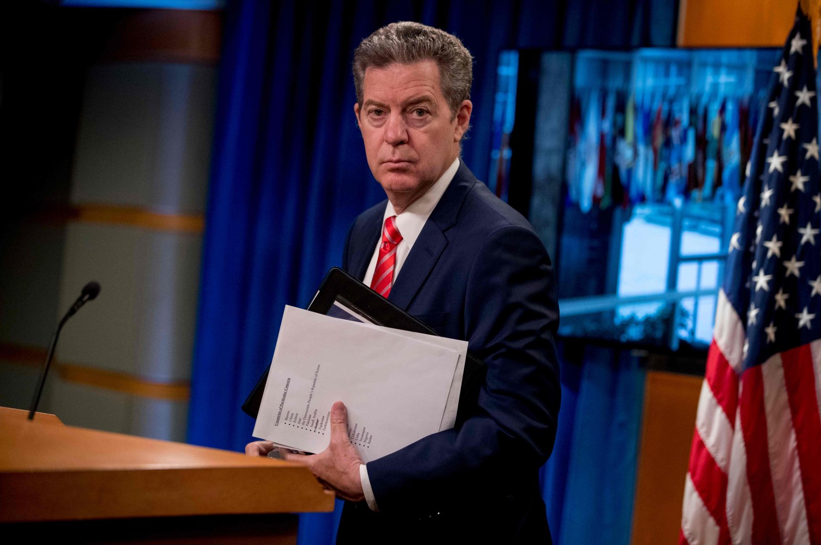 Ambassador at Large for International Religious Freedom, Sam Brownback, departs after speaking during a news conference at the State Department in Washington, D.C., June 10, 2020. (AFP Photo)