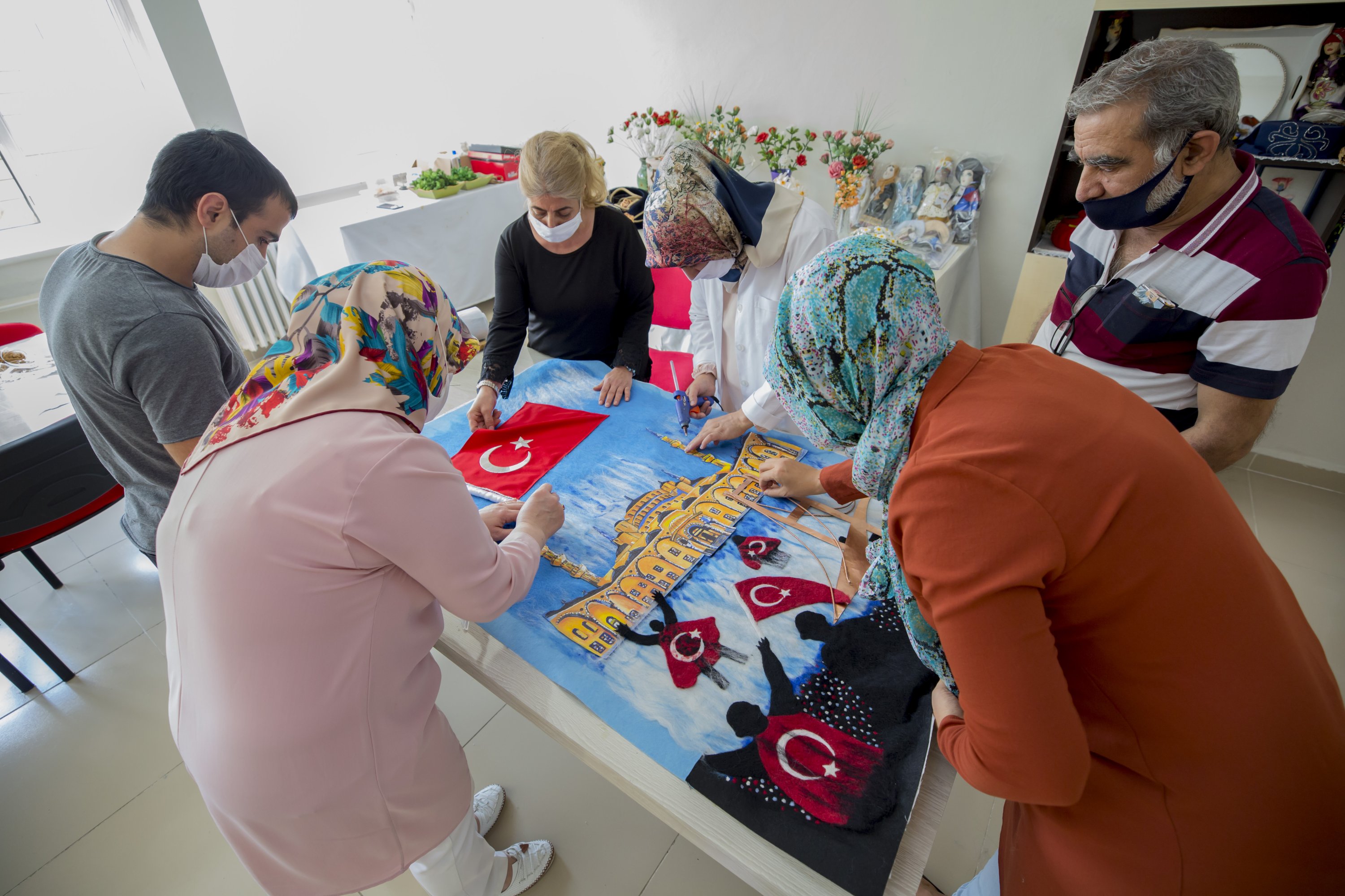 Instructors prepare the artwork at Diyarbakır’s Advanced Technical School for Girls, Diyarbakır, southeastern Turkey, July 3, 2020. (AA Photo)