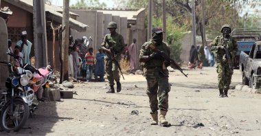 Nigerian troops patrolling in the streets of the remote northeast town of Baga, Borno State, April 30, 2013. (AFP Photo)