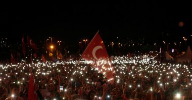 People attend a ceremony marking the second anniversary of the attempted coup at the July 15 Martyrs Bridge in Istanbul, Turkey, July 15, 2018. (Reuters Photo)