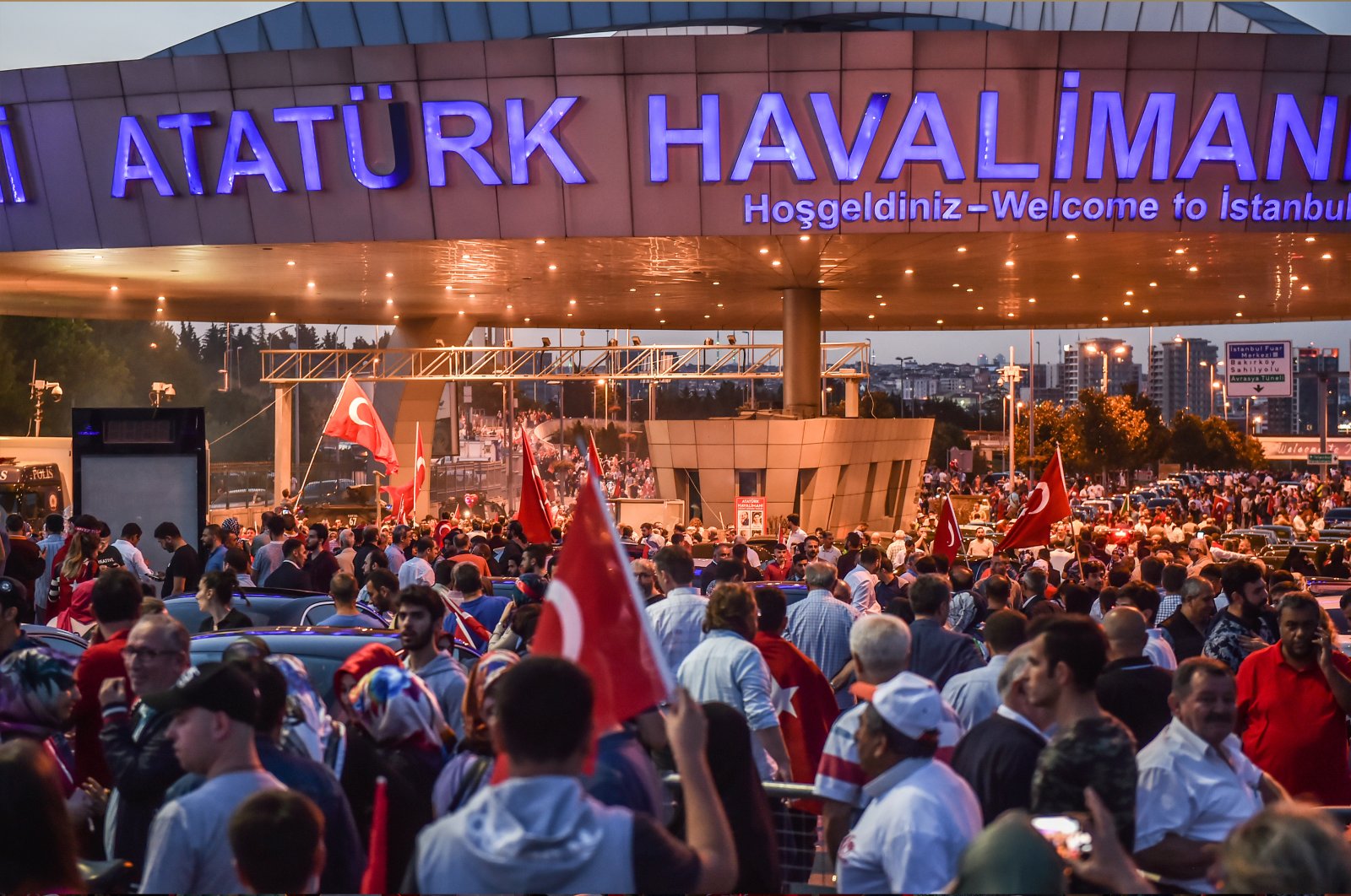 On the third anniversary of the July 15 coup attempt, Turkish citizens rallied at Atatürk Airport to show solidarity. (Shutterstock Photo)