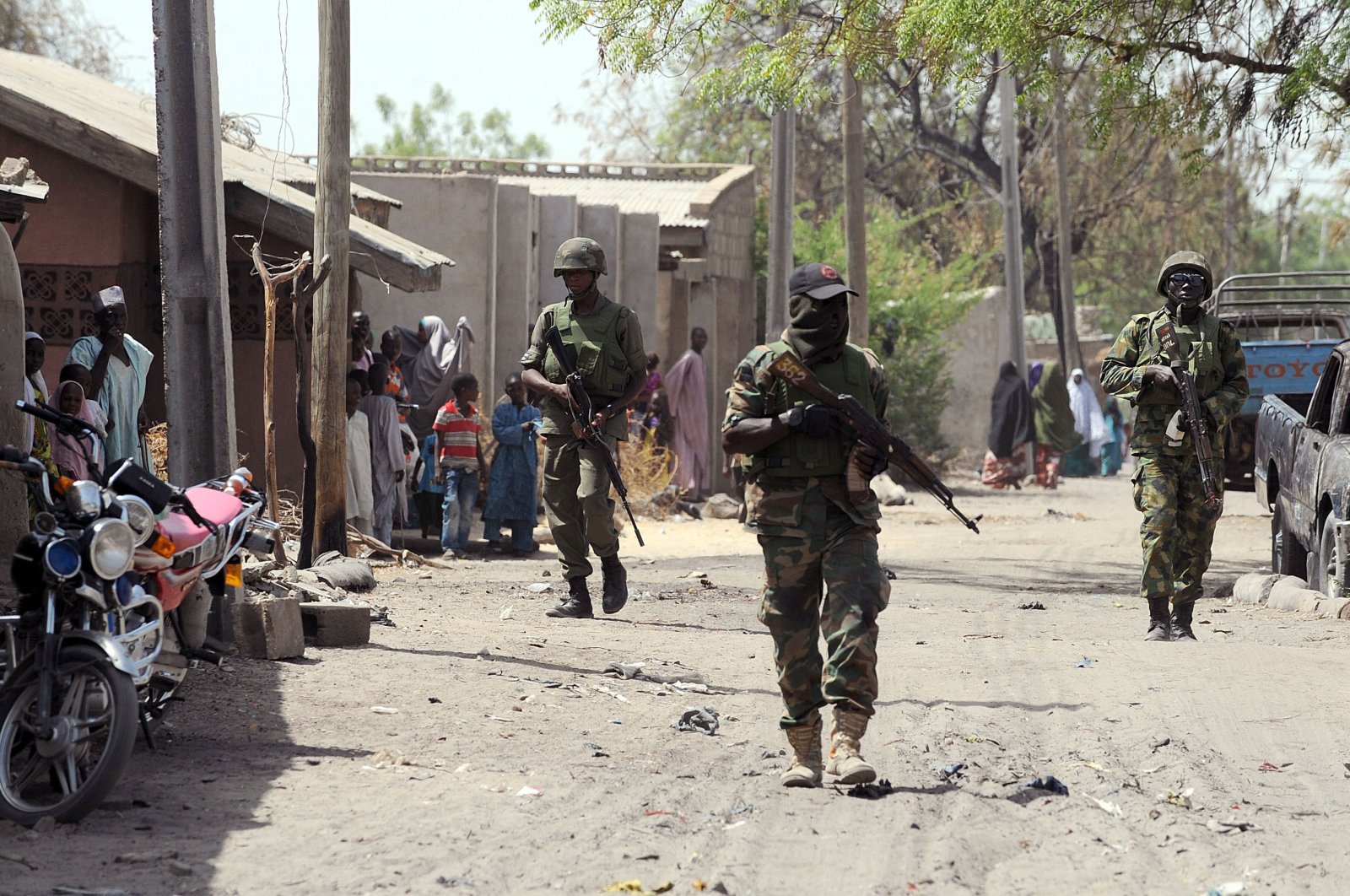 Nigerian troops patrolling in the streets of the remote northeast town of Baga, Borno State, April 30, 2013. (AFP Photo)
