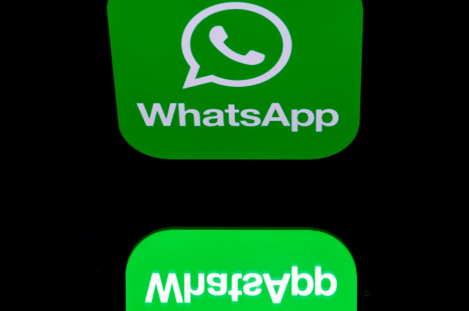 This Dec. 28, 2016, file photo, shows the logo of WhatsApp mobile messaging service in Paris. (AFP Photo)