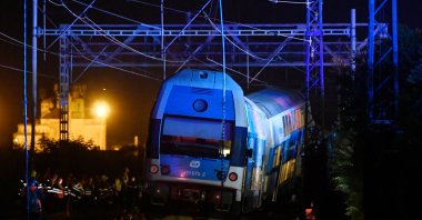 Rescuers work at the scene of a collision between passenger and freight trains in Cesky Brod, east of Prague, Czechia, July 14, 2020. (AP Photo)