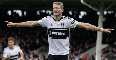Andre Schürrle celebrates a goal during a Premier League match against Arsenal in London, Oct. 7, 2018. (AP Photo)