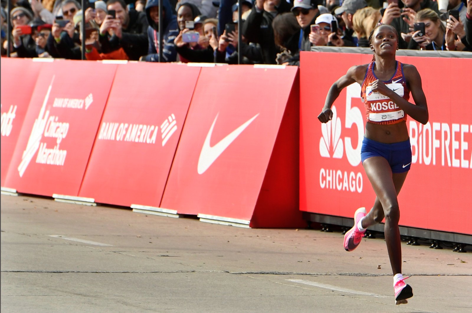 Brigid Kosgei of Kenya wins the Women's Chicago Marathon while setting a world record of 2:14:04, Chicago, U.S., Oct. 13, 2019. (AP Photo)