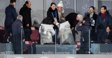 North Korea's Kim Jong Un's sister Kim Yo Jong shakes hand with South Korea's president Moon Jae-In during the opening ceremony of the Pyeongchang 2018 Winter Olympic games at the Pyeongchang stadium on Feb. 9, 2018. (AFP Photo)