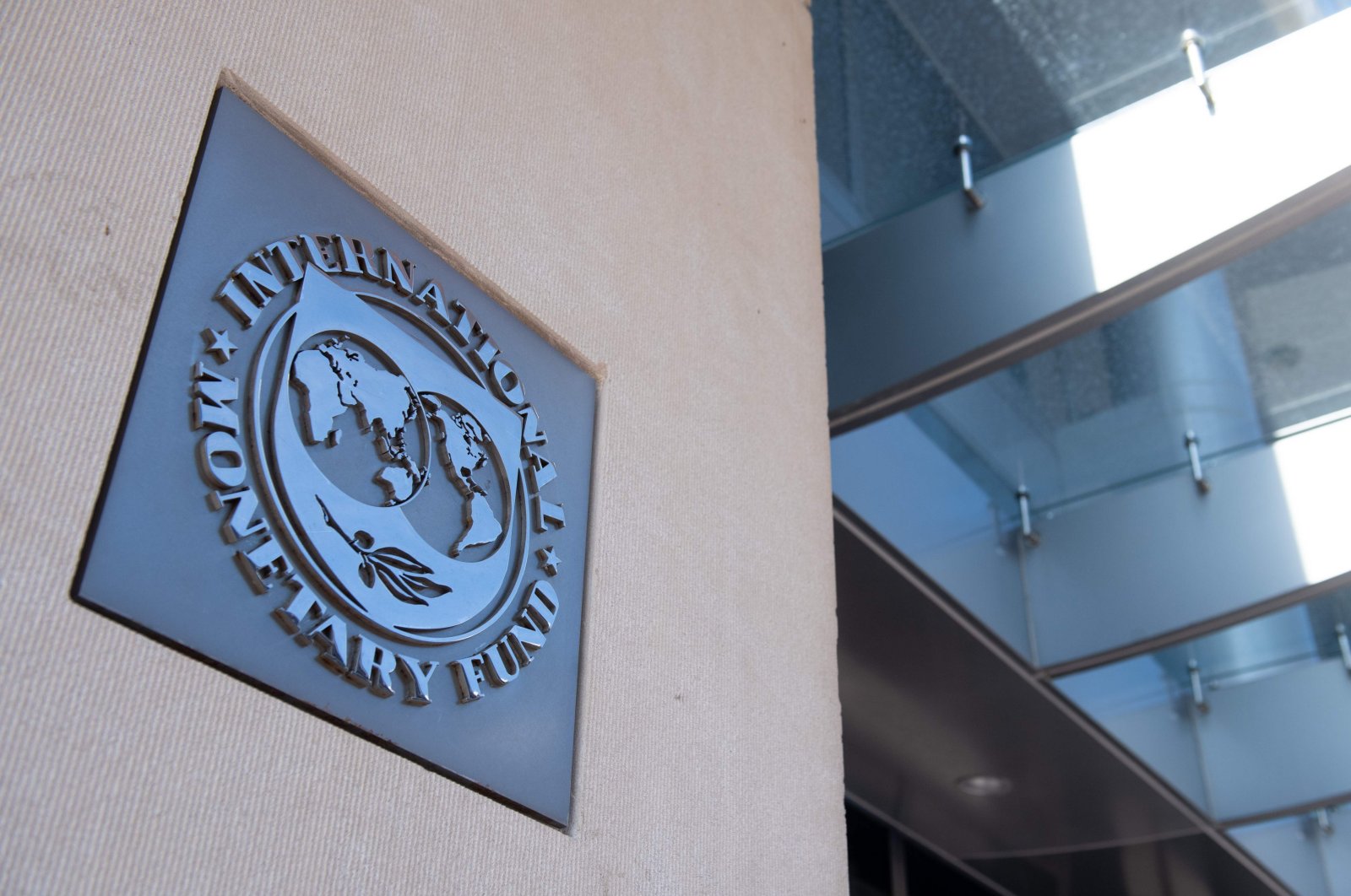 A sign is seen outside the headquarters of the International Monetary Fund (IMF) as the IMF and World Bank hold their Spring Meetings virtually due to the outbreak of COVID-19, known as coronavirus, in Washington, D.C., April 15, 2020. (AFP Photo)