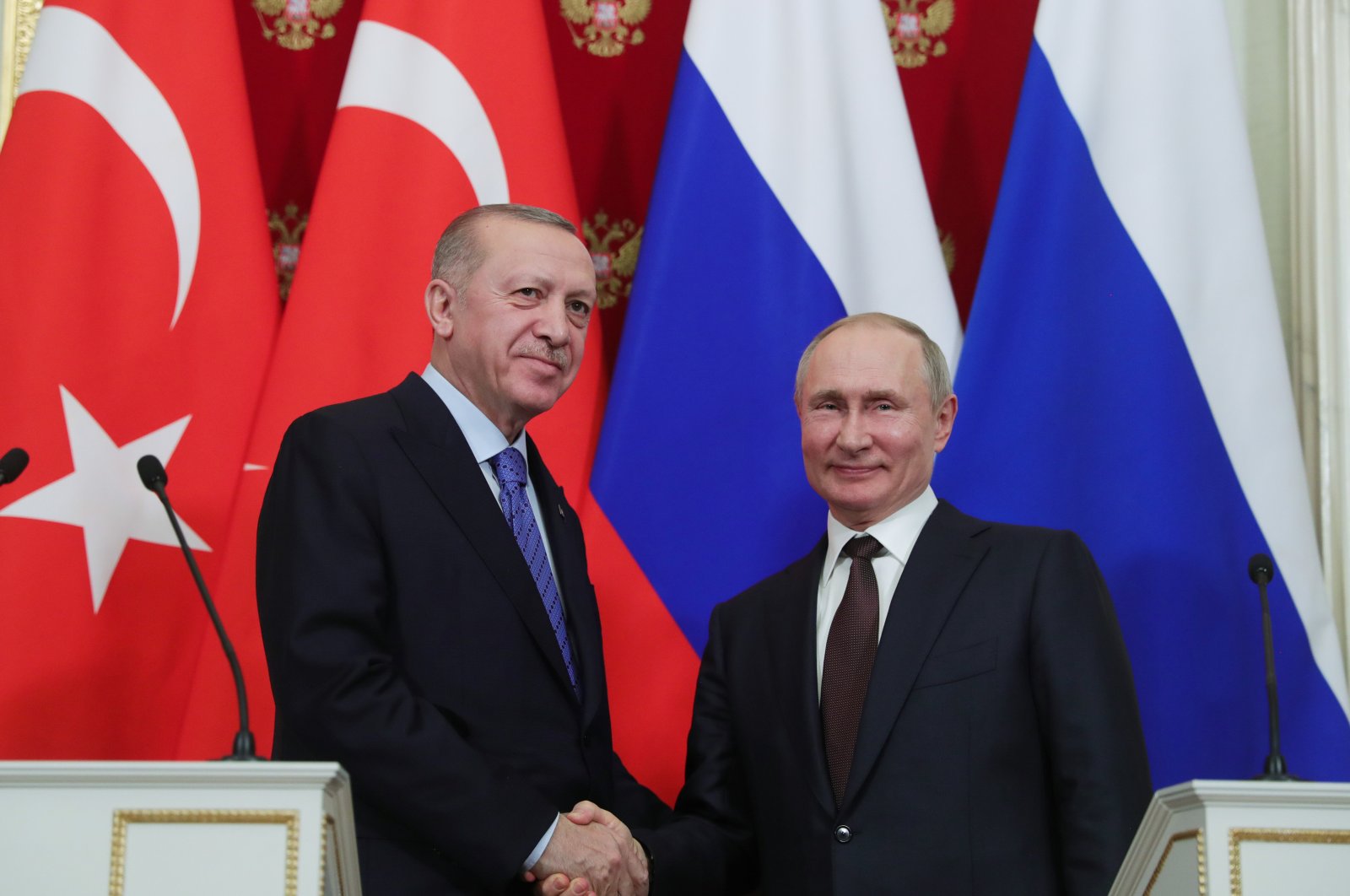 President Recep Tayyip Erdoğan shakes hand with Russian President Vladimir Putin following a joint press conference in Moscow, March 6, 2020. (AA) 