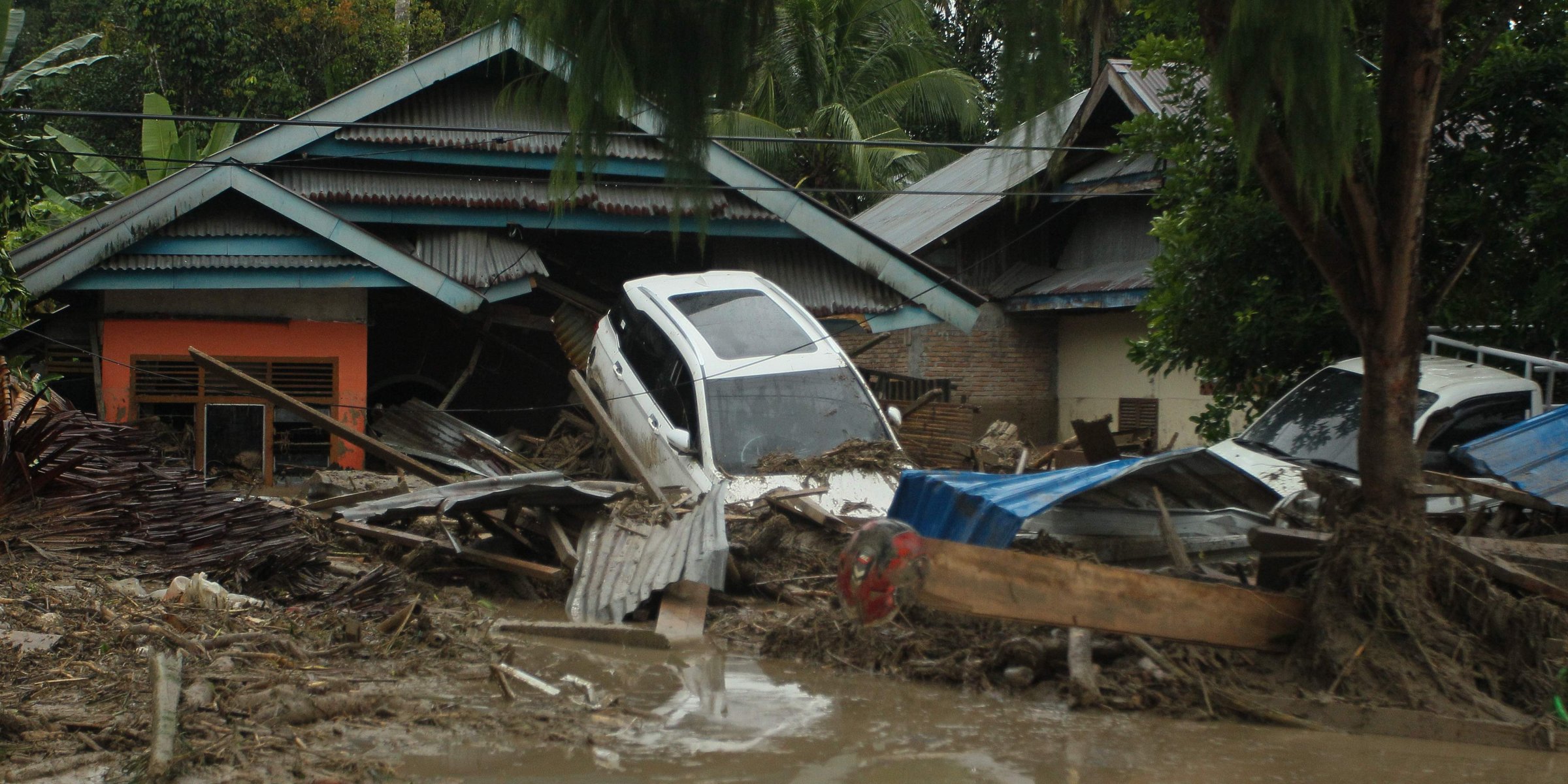 Rescuers hunt for dozens missing after floods kill 36 on Indonesia's ...