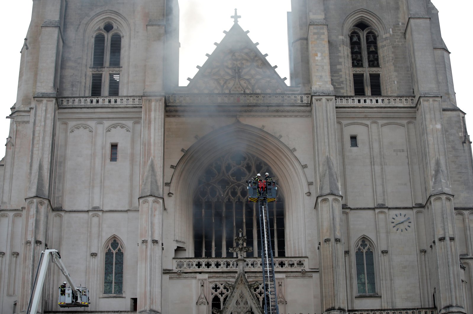 French firefighters battle a blaze at the Cathedral of Saint Pierre and Saint Paul in Nantes, France, July 18, 2020. (Reuters Photo)
