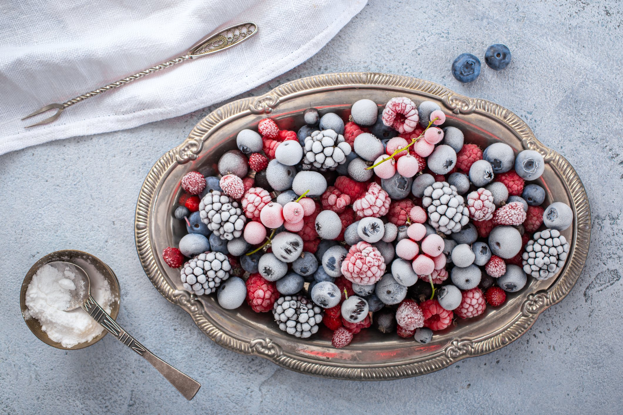 You can try dunking berries in yogurt and freezing them for bite-size snacks. (iStock Photo)