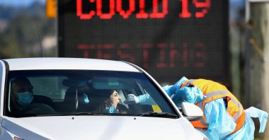A member of the public is seen getting a test for the coronavirus disease (COVID-19) at the Crossroads Hotel testing centre following a cluster of infections in Sydney, Australia, July 16, 2020. (Reuters Photo)