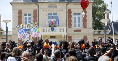 Assa Traore (C) delivers a speech prior to a demonstration against police brutality and racism in Beaumont-sur-Oise, near Paris, July, 18 2020. (EPA Photo)
