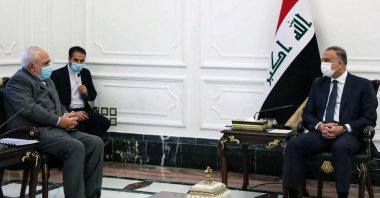 Iraqi Prime Minister Mustafa al-Kadhimi(L) meets with Iran's Foreign Minister Mohammad Javad Zarif, Baghdad, July 19, 2020. (AFP Photo)