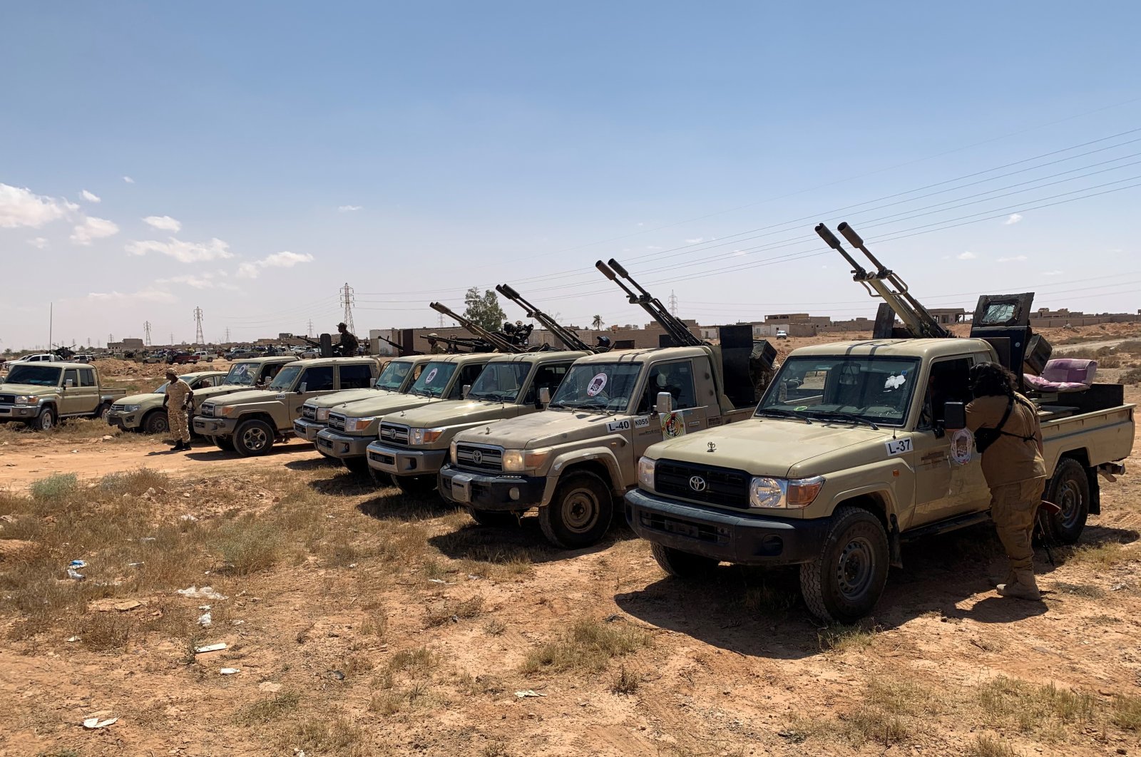 Troops loyal to Libya's internationally recognized government are seen in military vehicles as they prepare to head to Sirte, on the outskirts of Misrata, Libya, July 18, 2020. (Reuters Photo)