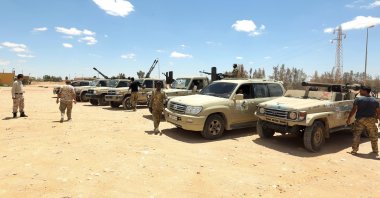 Forces loyal to the U.N.-recognized Libyan Government of National Accord (GNA) secure the area of Abu Qurain, halfway between the capital Tripoli and Libya's second-largest city Benghazi, against forces loyal to putschist Gen. Khalifa Haftar, July 20, 2020. (AFP Photo)