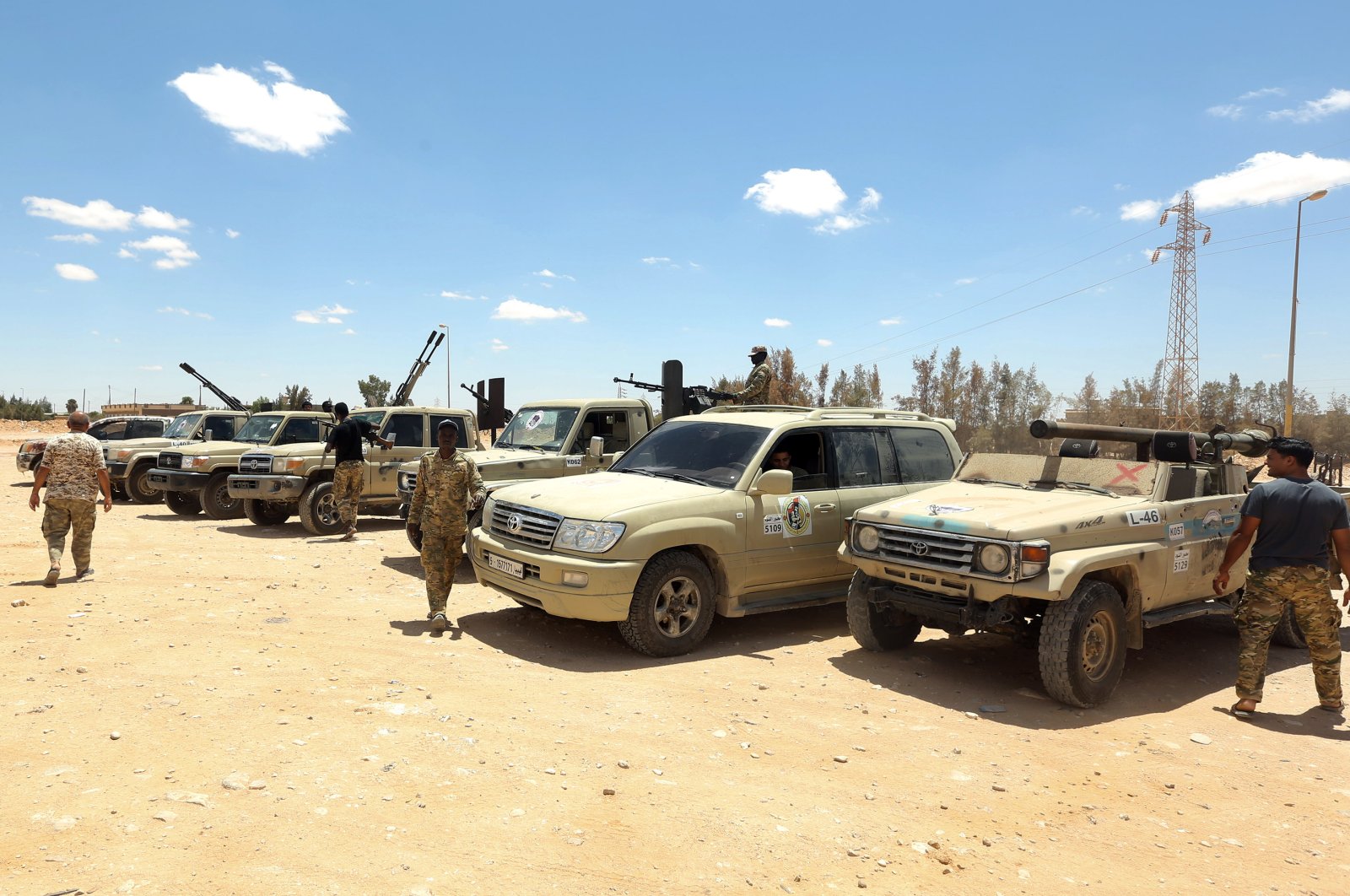 Forces loyal to the U.N.-recognized Libyan Government of National Accord (GNA) secure the area of Abu Qurain, halfway between the capital Tripoli and Libya's second-largest city Benghazi, against forces loyal to putschist Gen. Khalifa Haftar, July 20, 2020. (AFP Photo)