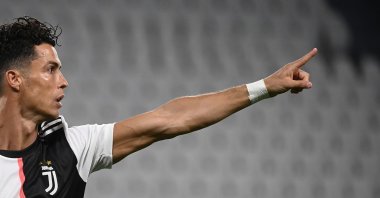 Juventus' Cristiano Ronaldo celebrates after scoring a goal during a Serie A match against Lazio, in Turin, Italy, July 20, 2020. (AFP Photo)
