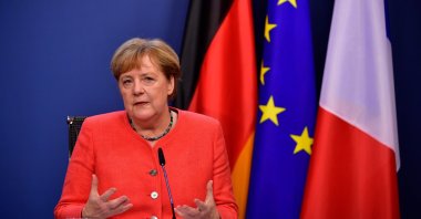 German Chancellor Angela Merkel speaks at the end of the European summit at the EU headquarters, Brussels, July 21, 2020. (AFP Photo)