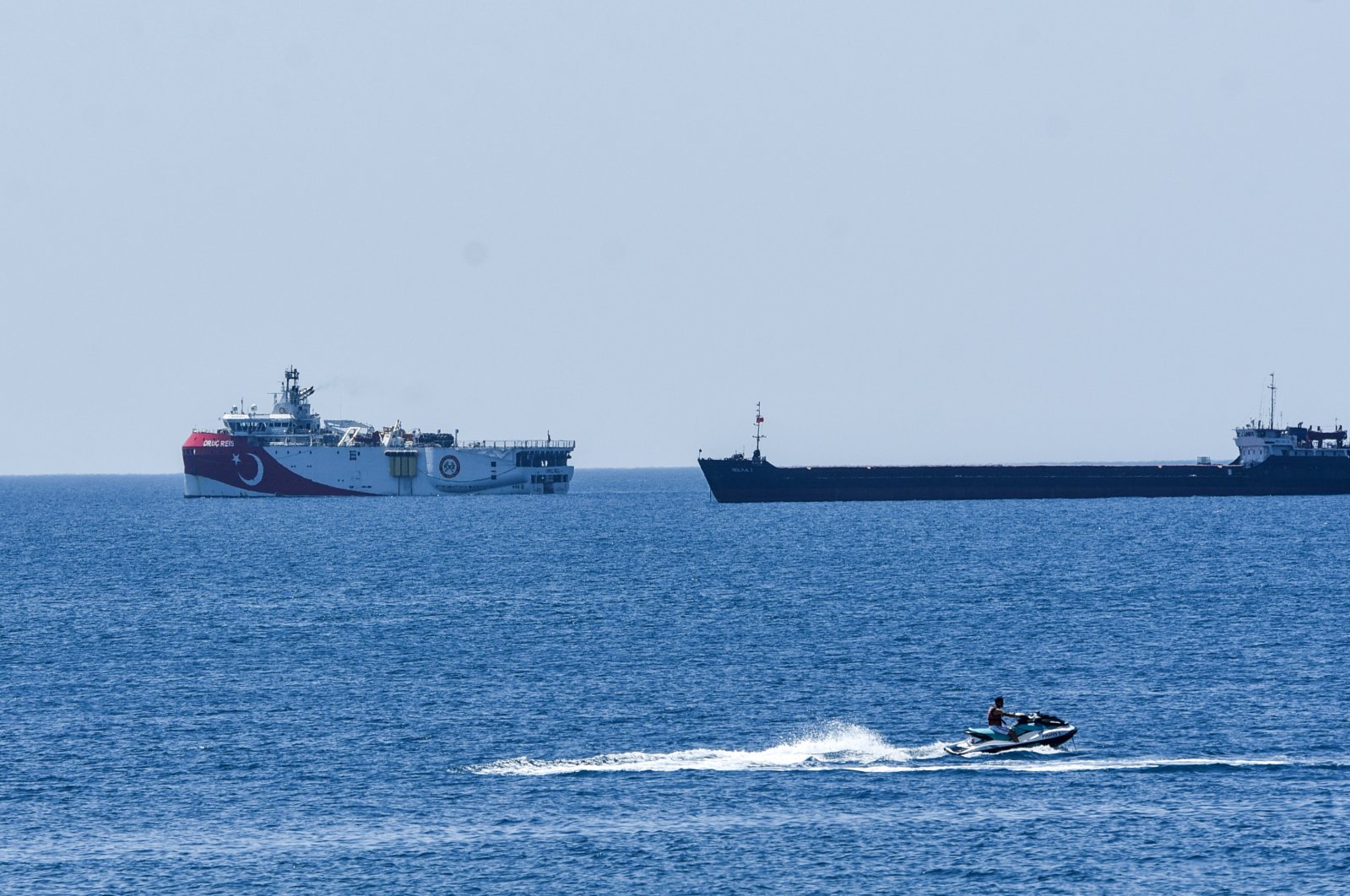 Turkey's seismic exploration vessel Oruç Reis is escorted by a Turkish Navy frigate off the shore of Antalya, southwest Turkey, July 22, 2020. (DHA Photo)


