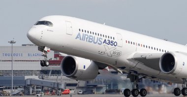 An Airbus A350 takes off at the aircraft builder's headquarters in Colomiers near Toulouse, France, Sept. 27, 2019. (Reuters Photo)