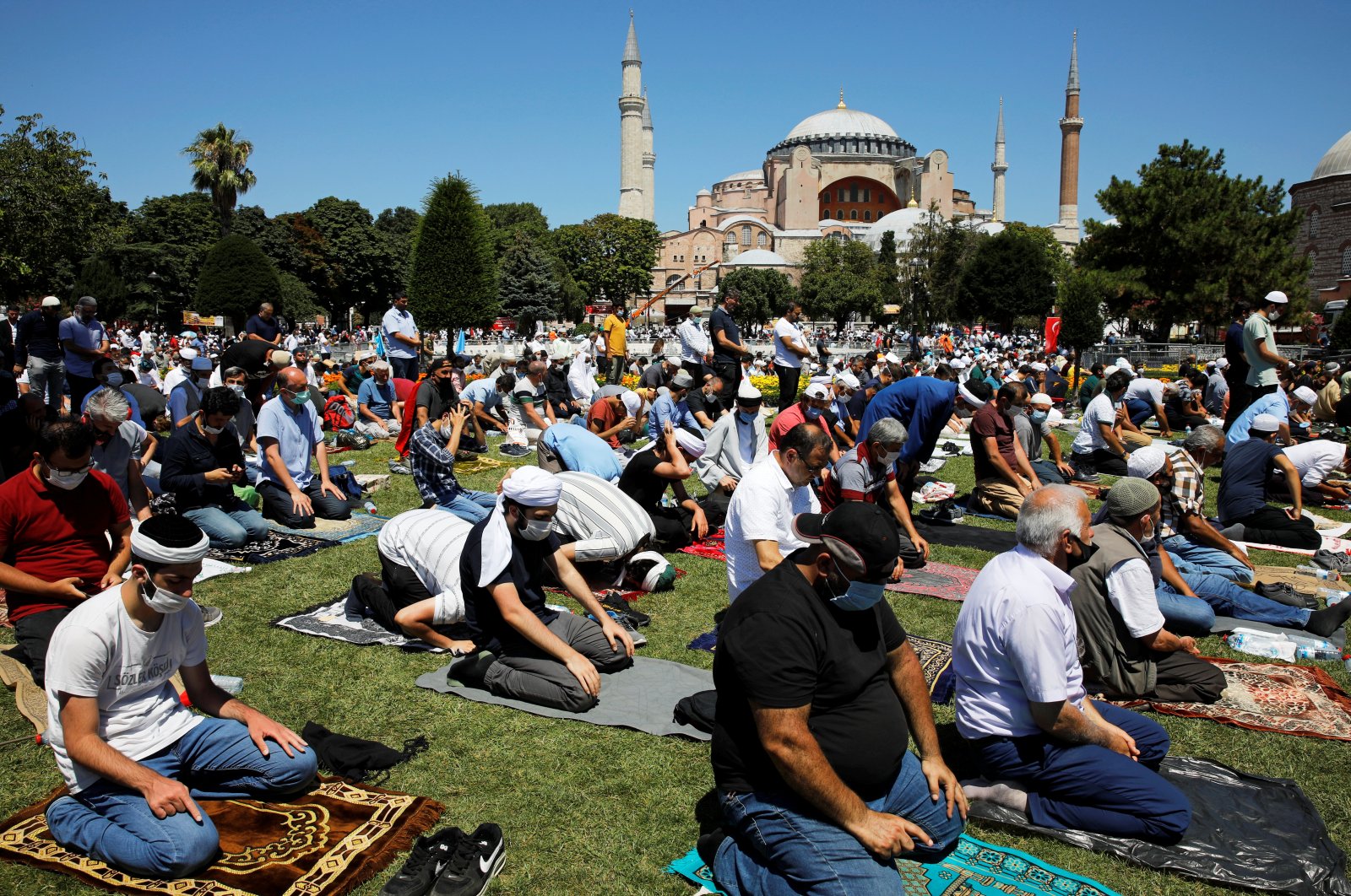 Muslims attend Friday prayers outside Hagia Sophia Grand Mosque for the first time after it was reopened as a mosque after 86 years, Istanbul, Turkey, July 24, 2020. (REUTERS Photo)