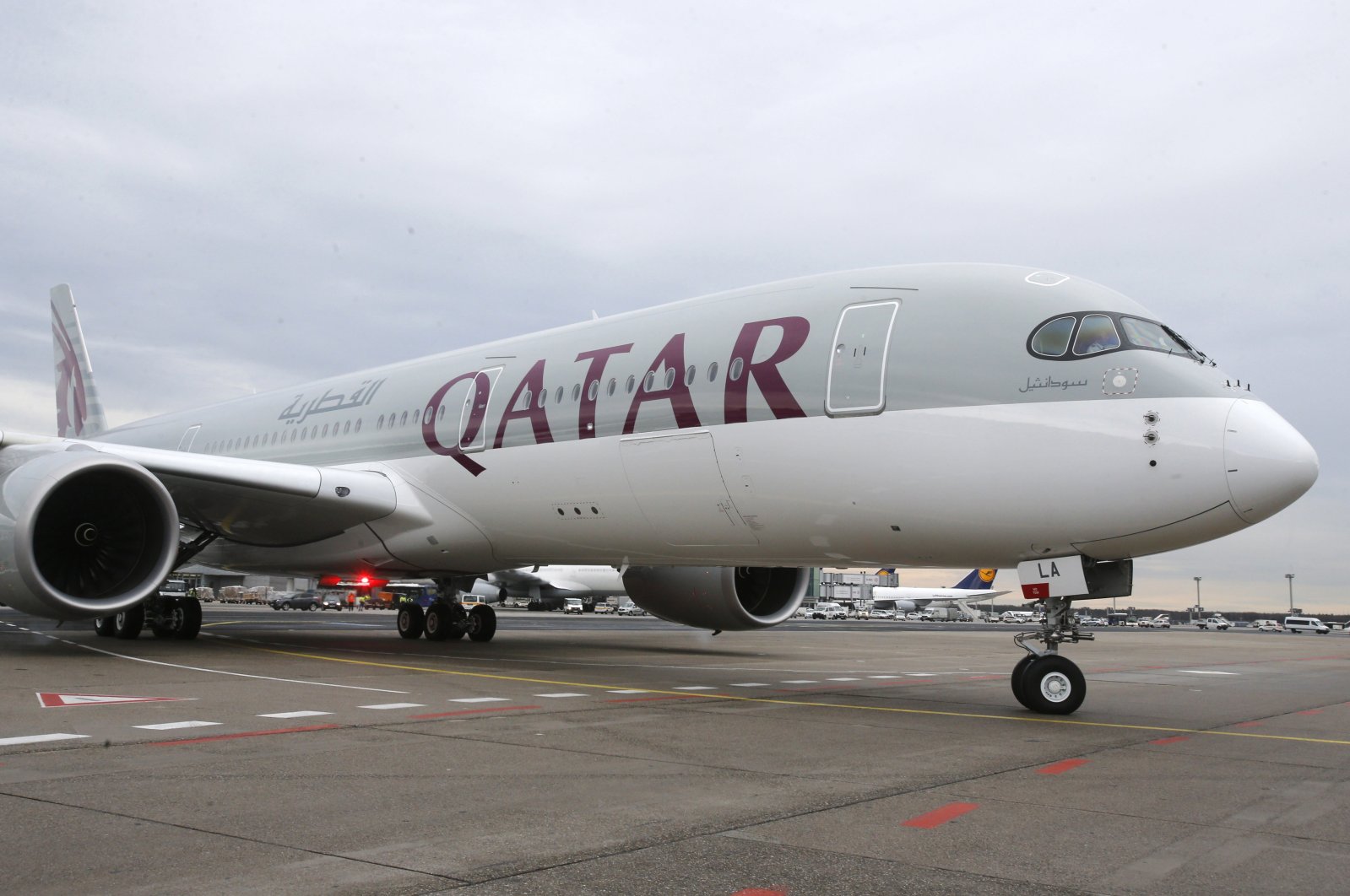 A new Qatar Airways Airbus A350 approaches the gate at the airport in Frankfurt, Germany, Jan. 15, 2015.  (AP Photo)