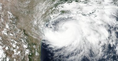 A handout satellite image made available by the National Aeronautics and Space Administration shows Tropical Storm Hanna as it moves trough the Gulf of Mexico and approaches Texas, 24 July 2020 (issued 25 July 2020). (EPA Photo/NASA Handout)