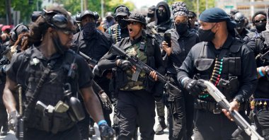 Grand Master Jay, center, leader of an all-black militia group called NFAC, leads his followers on a march during an armed rally in Louisville, Kentucky, U.S. July 25, 2020. (Reuters Photo)
