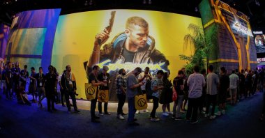 Attendees wait in line at the Cyberpunk 2077 booth during the opening day of E3, the annual video games expo revealing the latest in gaming software and hardware in Los Angeles, California, U.S., June 11, 2019. (REUTERS Photo)