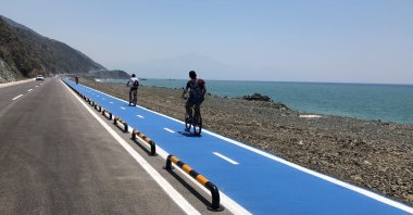 Cyclists ride on the new 25-kilometer bicycle lane, in Hatay province, southern Turkey, July 27, 2020. (IHA Photo)