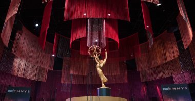 In this Sept. 12, 2019, file photo, an Emmy statue is seen on the stage at the 71st Emmy Awards Governors Ball press preview at LA Live in Los Angeles. (AFP Photo)