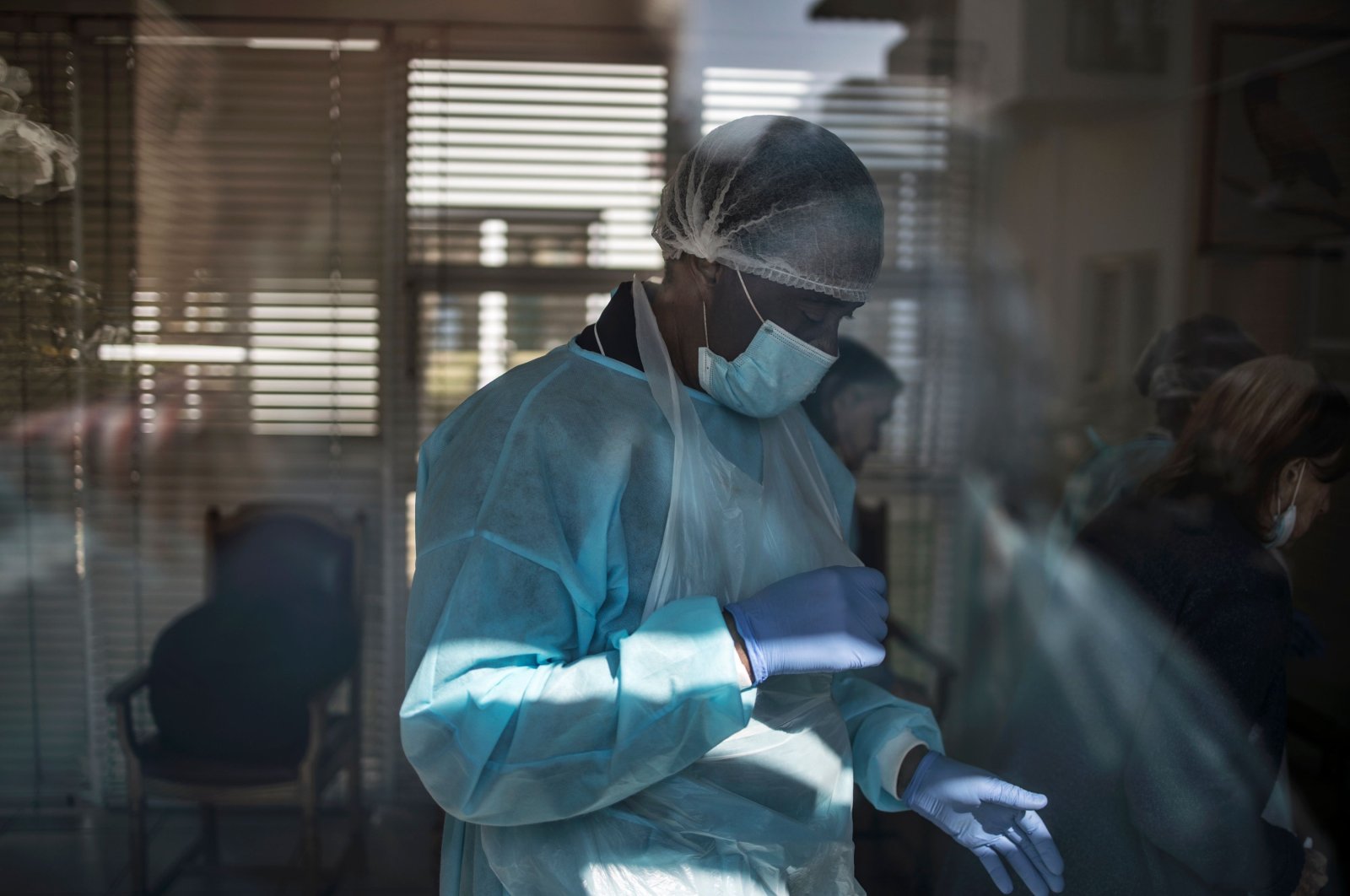 A nurse wearing personal protective equipment is seen at the Casa Serena nursing home, Johannesburg, South Africa, July 22, 2020. (AFP Photo)