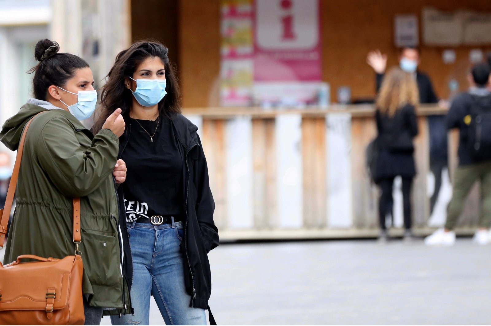 People wear protective face masks as a precaution against the coronavirus in Belgium's capital Brussels, July 28, 2020. (AA Photo)